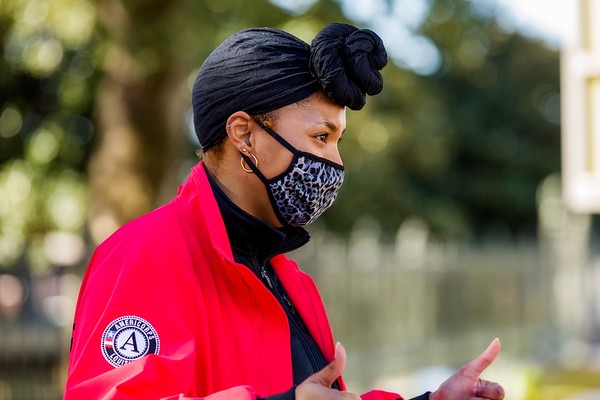 City Year AmeriCorps member wearing mask supporting students