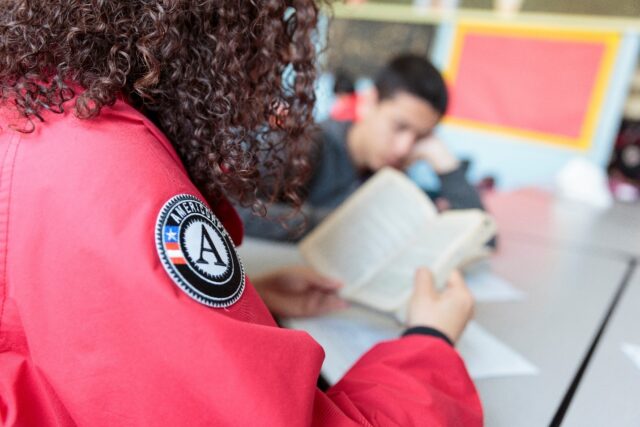 City Year AmeriCorps member service volunteer teaching