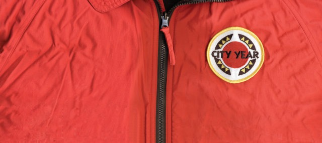 Front of the City Year jacket with zipper and logo patch.