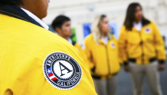 Close up of the AmeriCorps California patch on a yellow City Year jacket