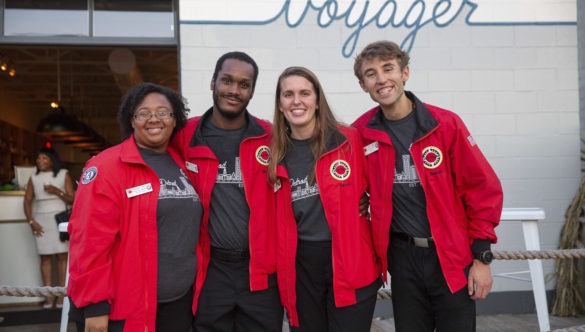 4 AmeriCorps members pose at a City Year event