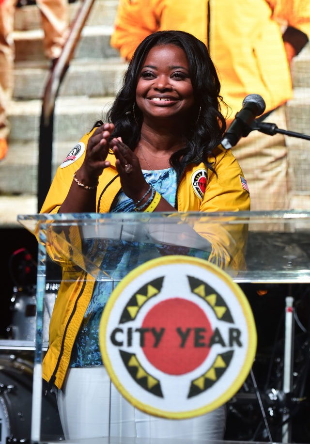 Octavia Spencer speaking at a podium at a City Year event