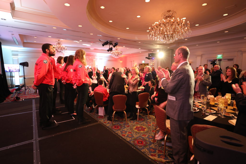 2019 Starry Starry Night attendees give AmeriCorps members a standing ovation.