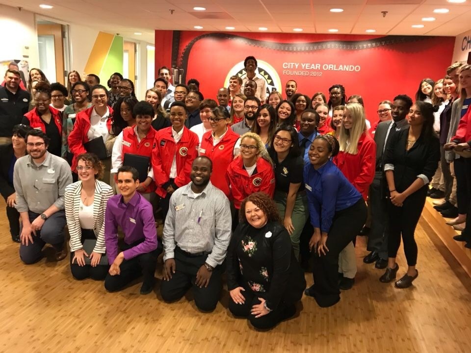 members of the Universal Orlando Resort Human Resources take a group picture with the Orlando corps