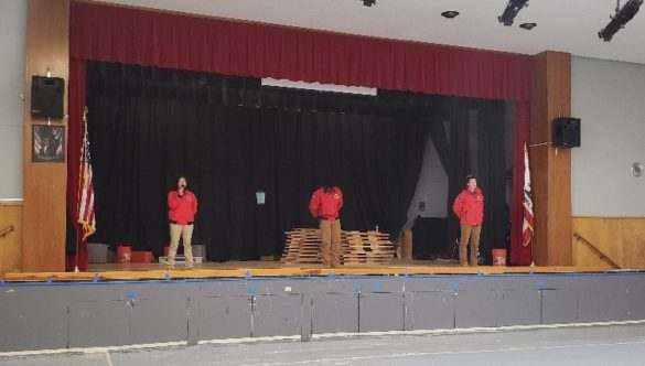 Rachel Rice, Mark Johnson and Jenna Kim conduct PT Practice in the Auditorium of Bret Harte Middle School in Hayward, CA.