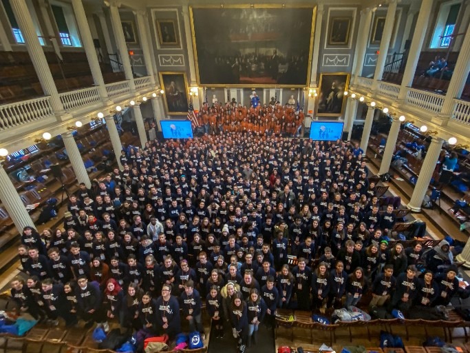 Representatives from all 351 town across Massachusetts pose for a picture before completing a powerful day of service in the city of Boston.