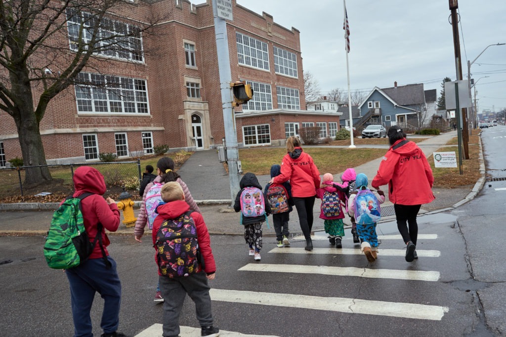 Walking bus City Years and students approach Bakersville School