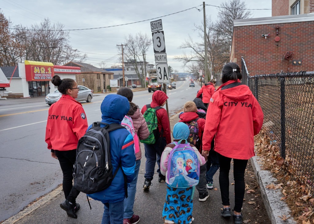 Students are guided to school by City Years on the walking bus