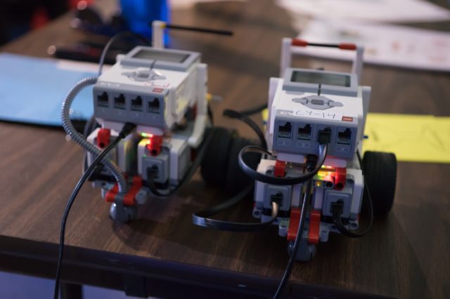 FIRST LEGO League robots wait to be programmed