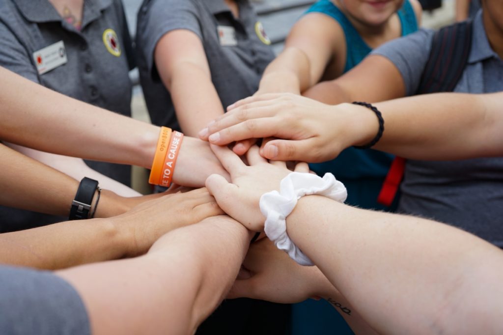 City Year members do a spirit break on their first day of school