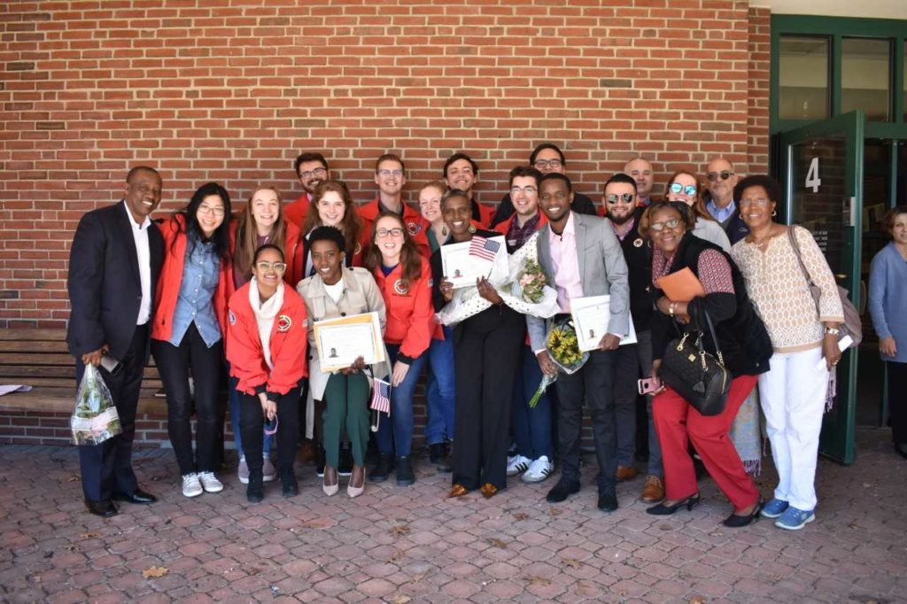 Olga Remesha and her family are joined by her City Year team for her citizenship ceremony