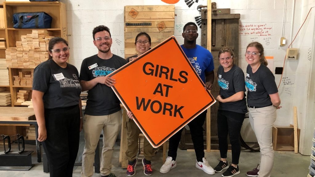 City Year members pose at Girls at Work after a day of service