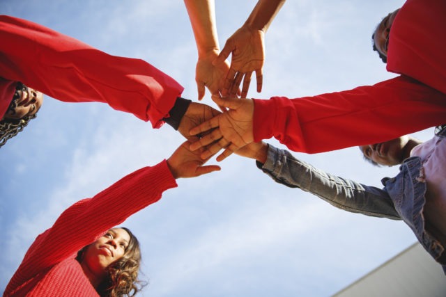 City Year morning greeting hands in