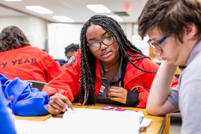 City Year AmeriCorps member in school service