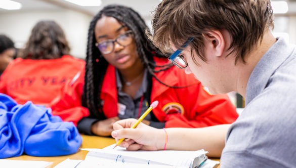 City Year AmeriCorps member in school service