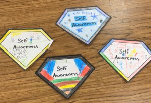 Badges from Meredith's Super Leaders Club