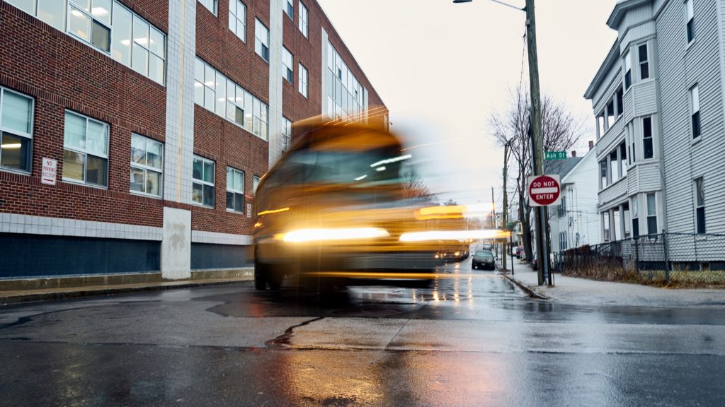 School bus pulls away from Manchester's Central High School