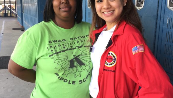 City Year Alum, Emily Wasek, poses with her partner teacher at a Duval County Public School.