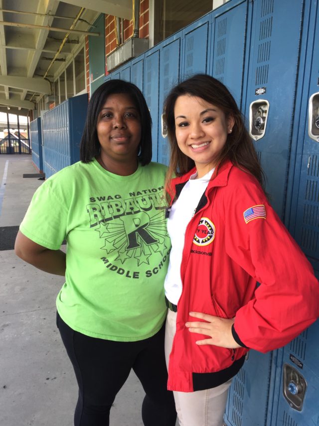 City Year alum Emily Wasek poses with her partner teacher at a Duval County Public School.