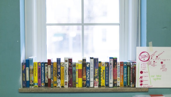 Books on a bookshelf in a City Year school
