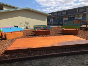 An outdoor classroom is shown. 