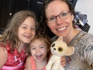 Kathleen smiles with two of her children.