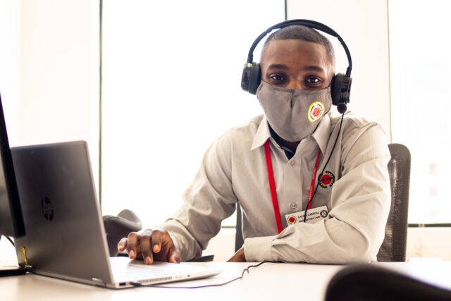 City Year AmeriCorps in school service with mask