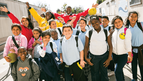 City Year AmeriCorps members with students at school