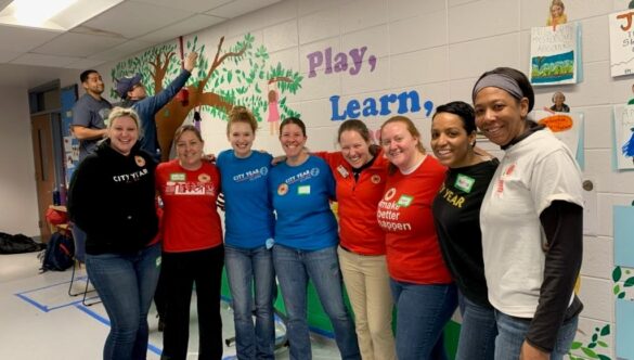 City Year AmeriCorps members and alumni in school