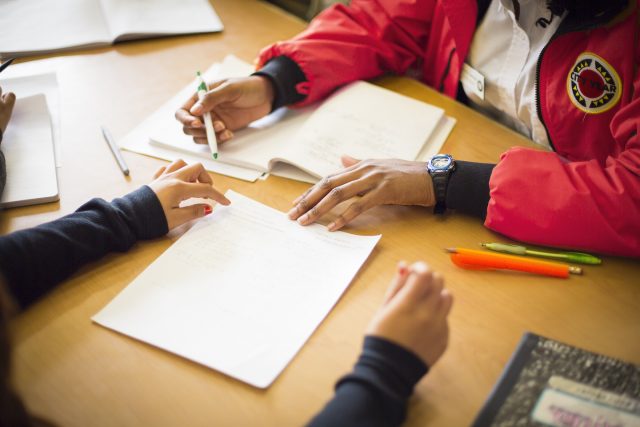 City Year member and student at school