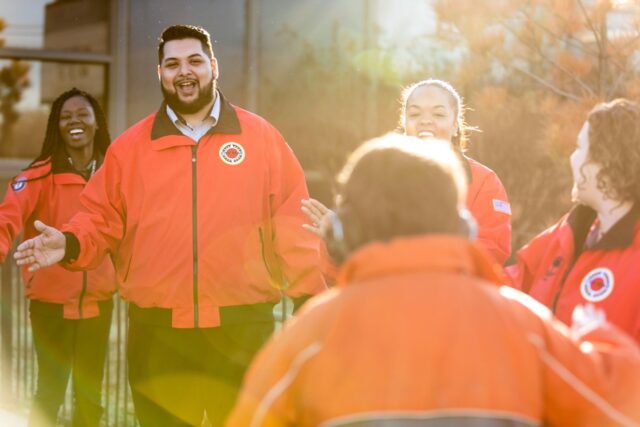 City Year AmeriCorps student success coaches morning greeting