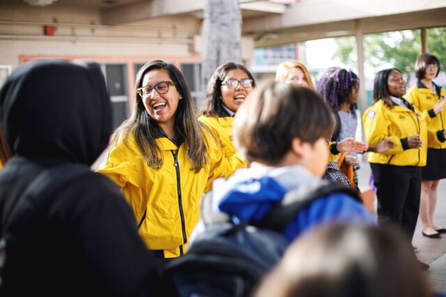 City Year AmeriCorps in school service yellow jacket