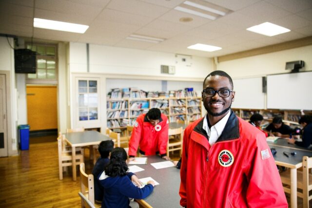 City Year AmeriCorps alum in school