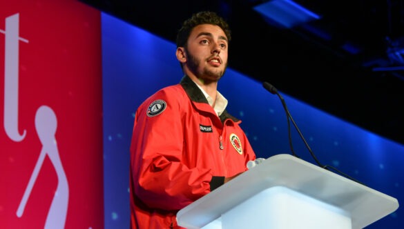 City Year alum speaking at an event