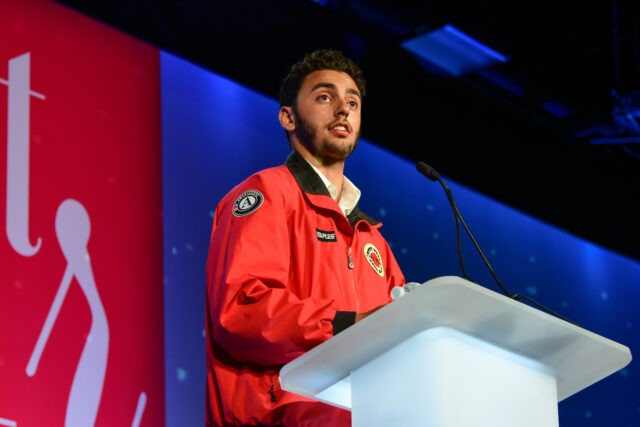 City Year alum speaking at an event