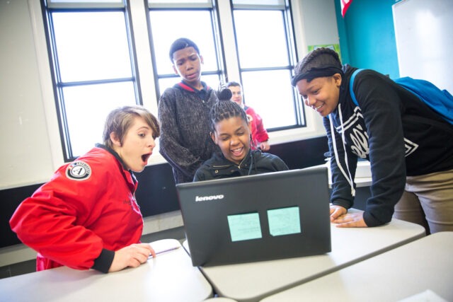 City Year AmeriCorps mentor with students