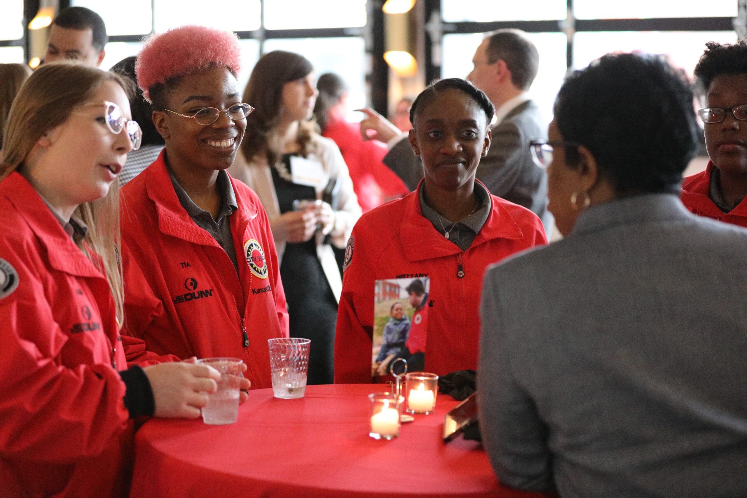 City Year AmeriCorps members talking with guests at CY Kansas City's First Annual Gala