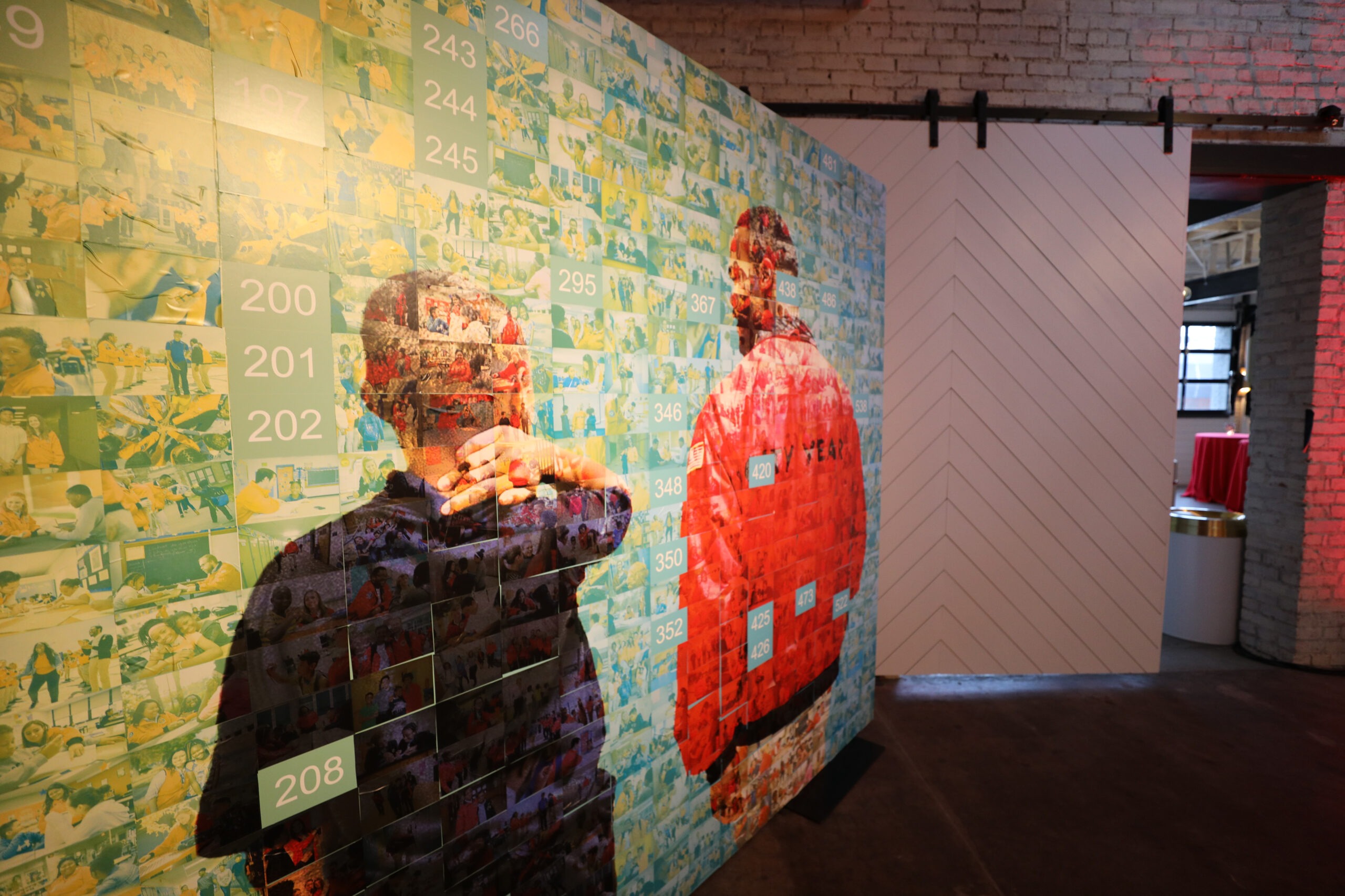 Photo display of an AmeriCorps member and student at CY Kansas City's First Annual Gala