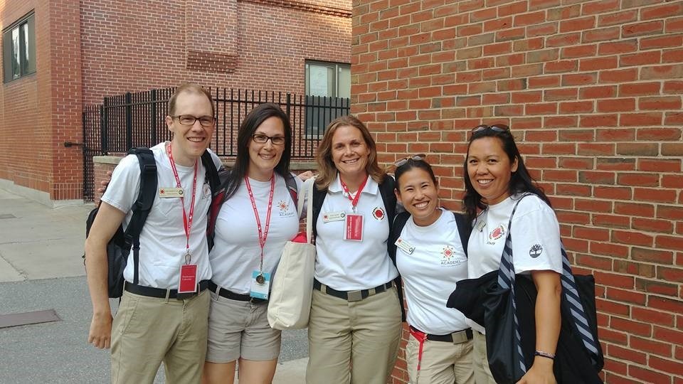 City Year alums smiling for a photo